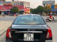 Daewoo Lacetti EX 2010 - Bán xe Daewoo Lacetti EX sản xuất 2010, màu đen xe gia đình, giá chỉ 235 triệu