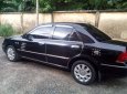 Ford Laser GHIA 2004 - Bán Ford Laser GHIA 2004, màu đen chính chủ, giá 242tr