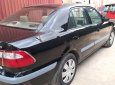 Mazda 626 2.0 MT 2001 - Cần bán lại xe Mazda 626 2.0 MT 2001, màu đen số sàn giá cạnh tranh