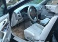 Mazda 626 2001 - Cần bán Mazda 626 đời 2001, màu đen, 210tr