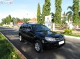 Ford Escape 2.3 2009 - Cần bán xe Ford Escape 2.3 sản xuất 2009, màu đen như mới