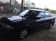 Ford Laser Delu 1.6 MT 2001 - Cần bán gấp Ford Laser Delu 1.6 MT sản xuất 2001, màu đen, giá 150tr