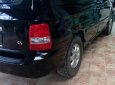 Kia Carnival GS 2.5 MT 2006 - Bán Kia Carnival GS 2.5 MT sản xuất 2006, màu đen, xe gia đình