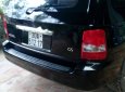 Kia Carnival GS 2.5 MT 2006 - Bán Kia Carnival GS 2.5 MT sản xuất 2006, màu đen, xe gia đình