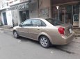 Daewoo Lacetti 2005 - Cần bán lại xe Daewoo Lacetti sản xuất năm 2005, màu vàng, giá tốt