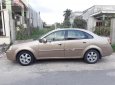 Daewoo Lacetti 2005 - Cần bán lại xe Daewoo Lacetti sản xuất năm 2005, màu vàng, giá tốt