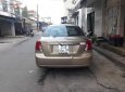 Daewoo Lacetti 2005 - Cần bán lại xe Daewoo Lacetti sản xuất năm 2005, màu vàng, giá tốt