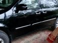 Kia Carnival GS 2.5 MT 2006 - Bán Kia Carnival GS 2.5 MT sản xuất 2006, màu đen, xe gia đình