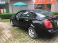 Daewoo Lacetti EX 2009 - Bán xe Daewoo Lacetti EX sản xuất 2009, màu đen