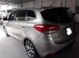 Kia Rondo DMT 2015 - Bán Kia Rondo DMT 2015, màu vàng cát, giá thương lượng, hỗ trợ góp