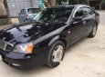 Daewoo Magnus 2004 - Bán xe Daewoo Magnus 2004, màu đen, giá 110tr