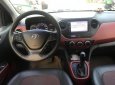 Hyundai Grand i10 1.25AT 2016 - Cần bán xe Hyundai Grand i10 1.25AT 2016, màu đỏ, xe nhập