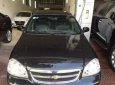 Chevrolet Lacetti 1.6 MT 2014 - Cần bán xe Chevrolet Lacetti 1.6 MT đời 2014, màu đen  