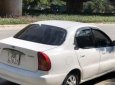 Daewoo Lanos SX 2004 - Cần bán xe Daewoo Lanos SX sản xuất 2004, màu trắng 