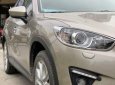 Mazda CX 5  2.0AT 2015 - Bán xe Mazda CX 5 2.0AT 2015, màu vàng giá tốt