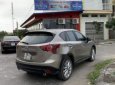 Mazda CX 5  2.0AT 2015 - Bán xe Mazda CX 5 2.0AT 2015, màu vàng giá tốt