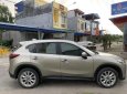 Mazda CX 5  2.0AT 2015 - Bán xe Mazda CX 5 2.0AT 2015, màu vàng giá tốt