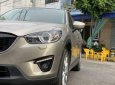 Mazda CX 5  2.0AT 2015 - Bán xe Mazda CX 5 2.0AT 2015, màu vàng giá tốt