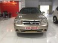 Daewoo Lacetti EX 2011 - Cần bán lại xe Daewoo Lacetti EX đời 2011, màu vàng cát