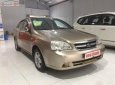 Daewoo Lacetti EX 2011 - Cần bán lại xe Daewoo Lacetti EX đời 2011, màu vàng cát