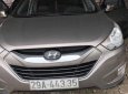 Hyundai Tucson 2011 - Chính chủ bán Hyundai Tucson đời 2011, màu xám, nhập khẩu nguyên chiếc