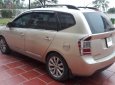 Kia Carens EX 2011 - Gia đình cần bán Kia Carens đời 2011, bản đủ, máy 2.0,cửa nóc, màu vàng cát