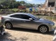 Mazda 6 2.0AT 2016 - Cần bán xe Mazda 6 2.0AT đời 2016, màu bạc xe gia đình