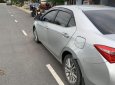 Toyota Corolla altis 2015 - Bán Toyota Corolla Altis năm sản xuất 2015, màu bạc, nhập khẩu nguyên chiếc số sàn, giá tốt