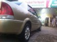 Ford Laser 2000 - Cần bán xe Ford Laser năm 2000, màu vàng, giá chỉ 160 triệu