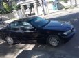 BMW 3 Series 320i 1997 - Cần bán BMW 320i 1997, màu đen, xe nhập