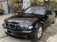 BMW 3 Series 318i 2.0 2005 - Bán xe BMW 3 Series 318i 2.0 năm 2005, màu đen chính chủ, giá chỉ 260 triệu