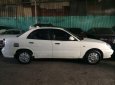 Daewoo Nubira  II  2004 - Cần bán gấp Daewoo Nubira II 2004, màu trắng xe gia đình