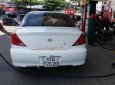 Kia Spectra 2004 - Bán xe Kia Spectra đời 2004, màu trắng còn mới, giá tốt