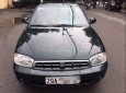 Kia Spectra LS 2004 - Cần bán gấp Kia Spectra LS 2004, màu đen, xe nhập, số sàn