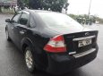 Ford Focus 1.8MT 2010 - Cần bán gấp Ford Focus 1.8MT đời 2010, màu đen xe gia đình
