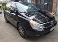 Kia Carnival 2.7 MT 2010 - Bán Kia Carnival 2.7 MT năm 2010, màu đen, nhập khẩu nguyên chiếc  