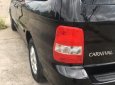 Kia Carnival GS 2006 - Bán Kia Carnival GS năm 2006, màu đen