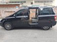 Kia Carnival 2.7 MT 2010 - Bán Kia Carnival 2.7 MT năm 2010, màu đen, nhập khẩu nguyên chiếc  