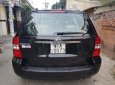 Kia Carnival 2.7 MT 2010 - Bán Kia Carnival 2.7 MT năm 2010, màu đen, nhập khẩu nguyên chiếc  