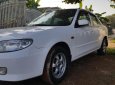 Mazda 323 2004 - Cần bán xe Mazda 323 sản xuất 2004, màu trắng, 152tr