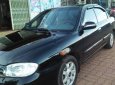 Kia Spectra 1.6 2004 - Bán ô tô Kia Spectra 1.6 sản xuất năm 2004, màu đen