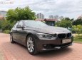BMW 3 Series 320i 2013 - Cần bán BMW 3 Series 320i đời 2013, màu nâu, xe nhập  