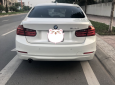 BMW 3 Series 320i 2013 - Bán xe BMW 3 Series sản xuất 2013 màu trắng, 880 triệu, nhập khẩu nguyên chiếc