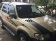 Ford Escape   2003 - Bán xe Ford Escape đời 2003, màu vàng, chính chủ