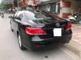 Toyota Camry 2.4G 2011 - Bán xe Toyota Camry 2.4G 2011, màu đen, 645tr