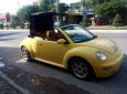 Volkswagen New Beetle    2003 - Xe Volkswagen New Beetle mui trần, đăng ký lần đầu 2003, màu vàng xe nhập