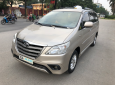 Toyota Innova E 2014 - Cần bán Toyota Innova E sản xuất năm 2014, màu vàng