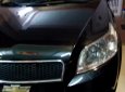 Chevrolet Aveo 2014 - Cần bán gấp Chevrolet Aveo năm 2014, màu đen như mới