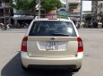 Kia Carens EX 2.0 MT 2012 - Cần bán Kia Carens EX 2.0 AT 2012, màu vàng đồng, nhập khẩu, còn rất mới