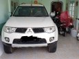 Mitsubishi Pajero Sport 2013 - Cần bán Mitsubishi Pajero Sport năm 2013, màu trắng đã đi 100.000km